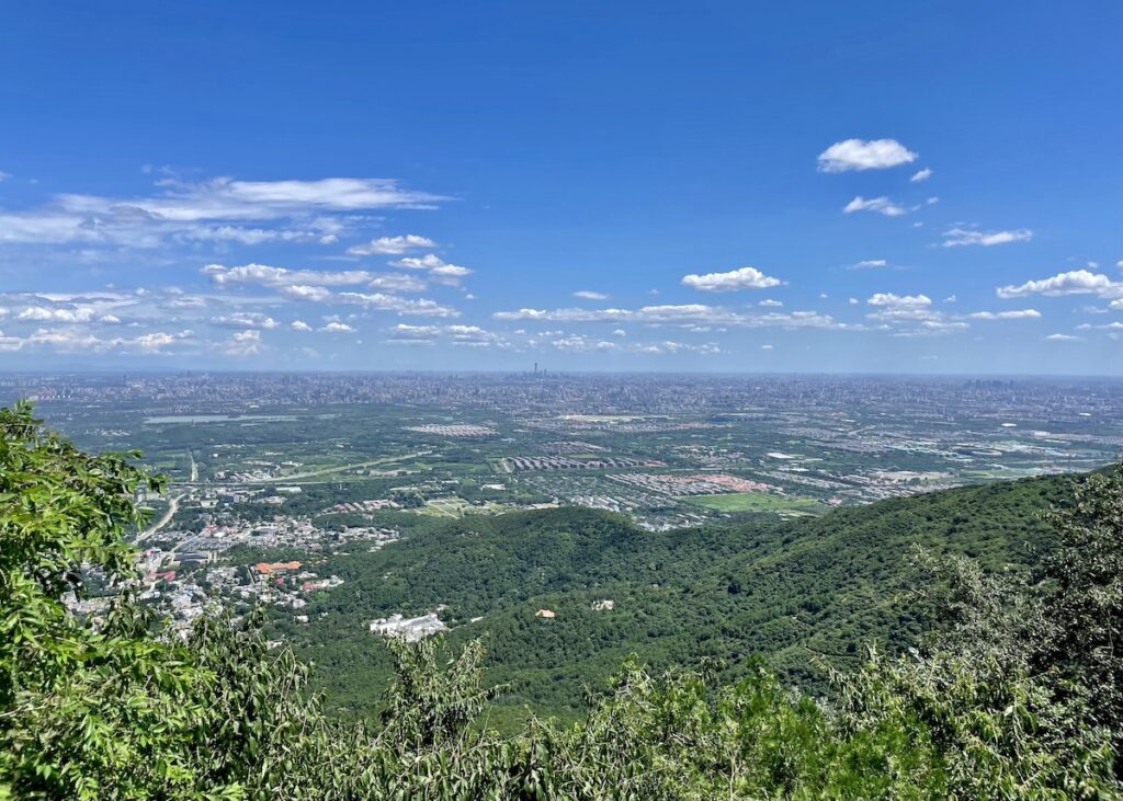 view of downtown Beijing from Fragrant Hills Park Beijing - onaroadtonowhere.com