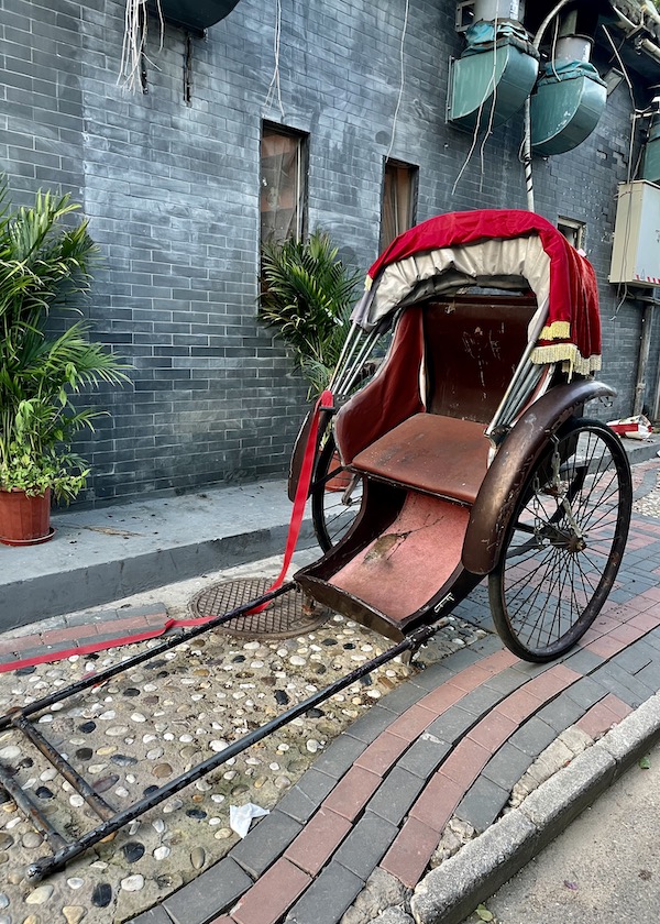 rickshaw on the streets of Beijing, China - onaroadtonowhere.com