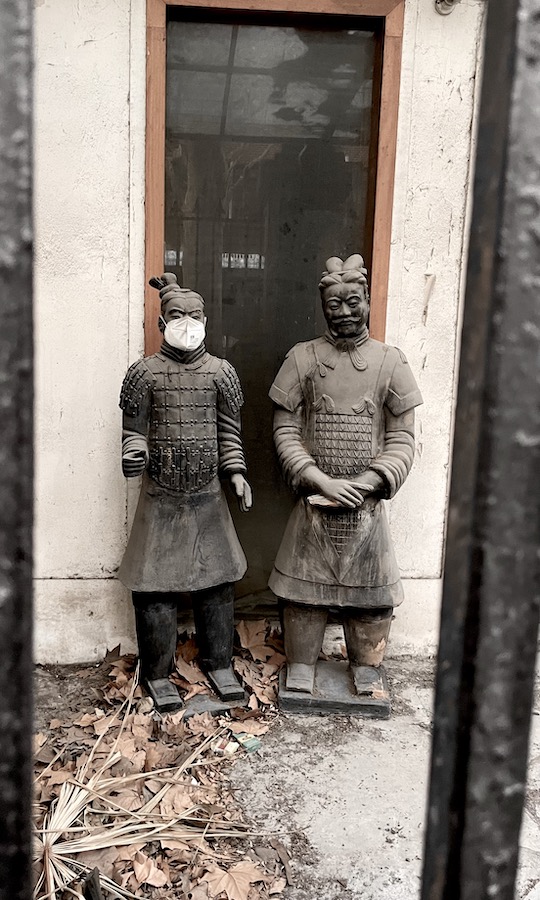 Terracotta warriors wear masks during China's latest COVID-19 Omicron outbreak. onaroadtonowhere.com