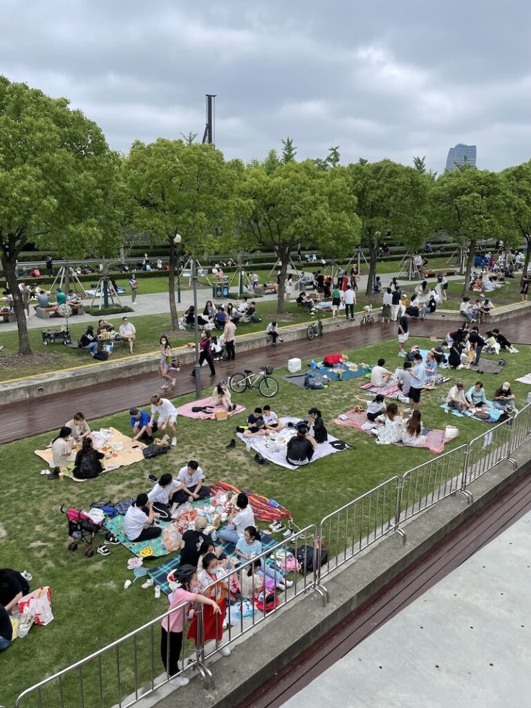 People enjoying being outside in Shanghai after the lockdown ends