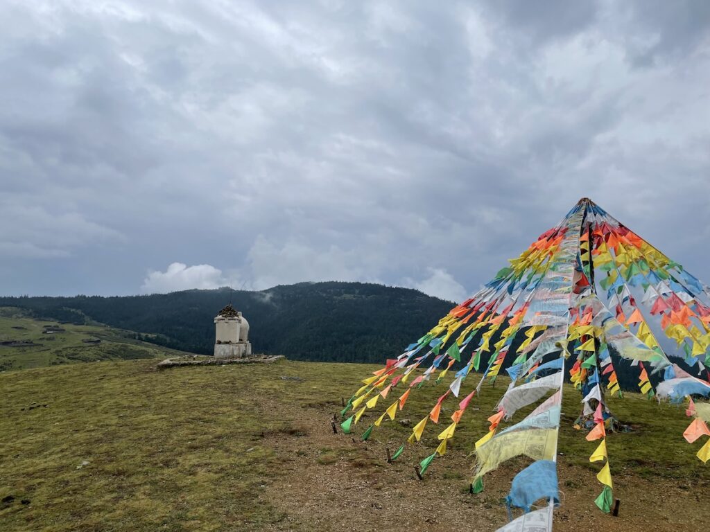 Tibetan Buddhist prayer flags on mountaintop in Yunnan, China