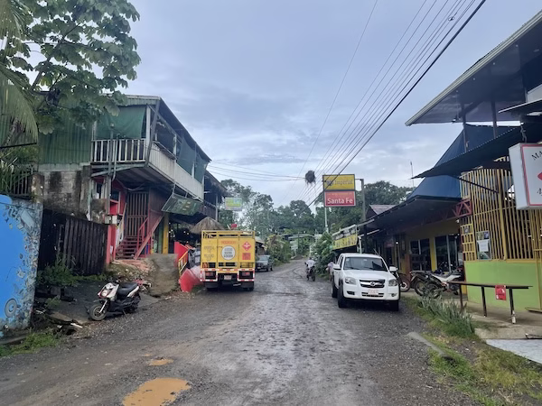 A muddy street in the town of Drake Bay on Costa Rica's Osa Peninsula