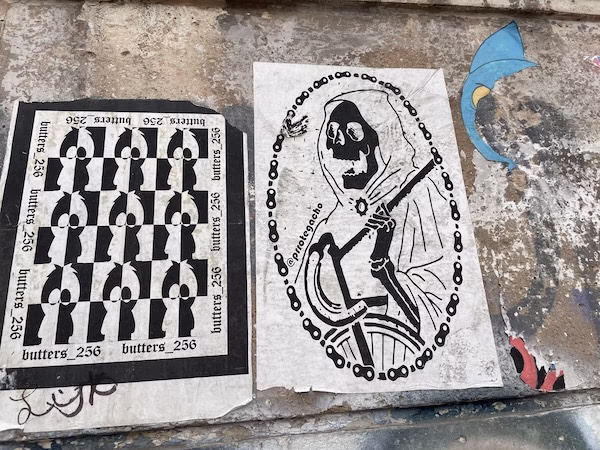Graffiti of death with a bicycle and Butters from South Park