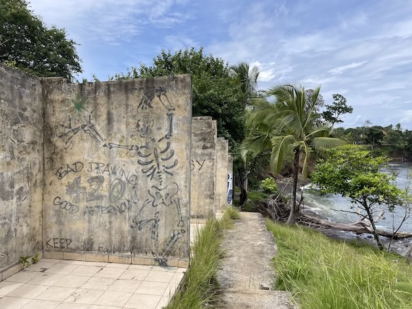 Graffiti on the wall of a ruined resort building in Santa Catalina, Panama