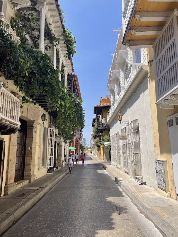 A street with fancy colonial buildings and balconies in Cartagena