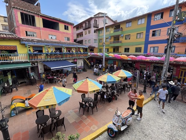 A colorful, touristy square in central Guatapé