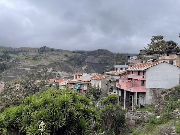 Houses built on a steep hill side in Aluasí