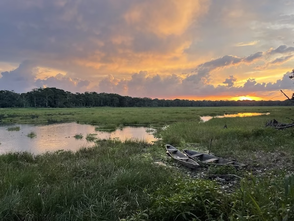Sunset over a lake in the Amazon
