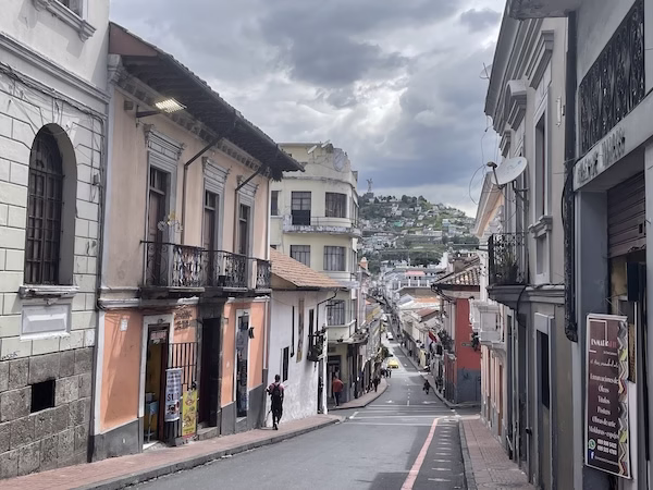A street with colonial buildings in central Quito