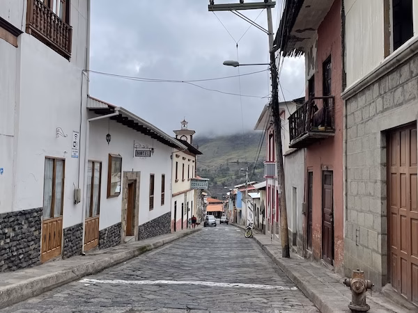 A brick street and 19th century buildings in the town of Alausí