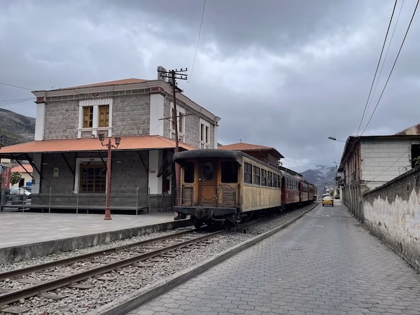 An old train car sits unused in Alausí, Ecuador