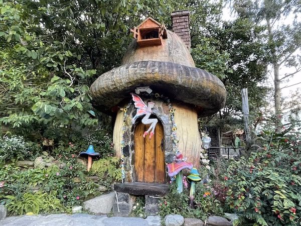 A fiberglass mushroom house for fairies in Baños, Ecuador at the Bosque Encantado