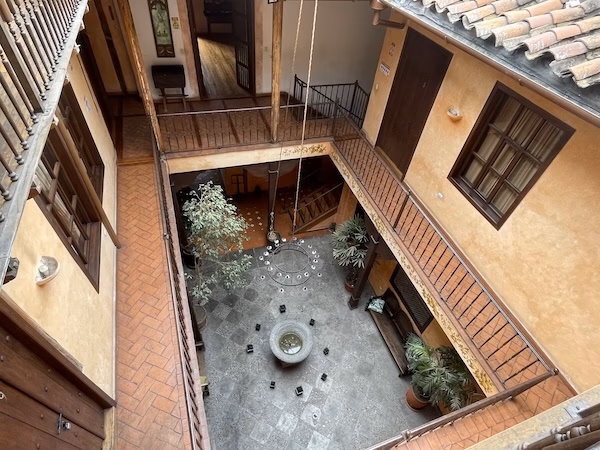An interior balcony in a Spanish colonial style hotel