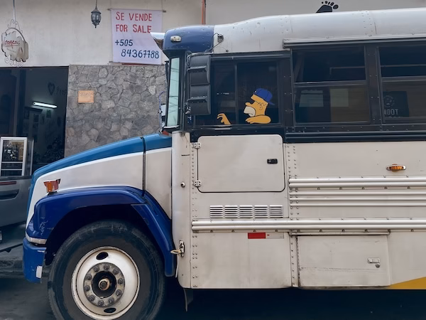 Homer Simpson drives a chicken bus in Leon, Nicaragua