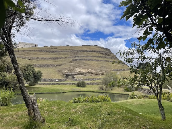 A large mound showing the foundations of Inca ruins of Pumapungo