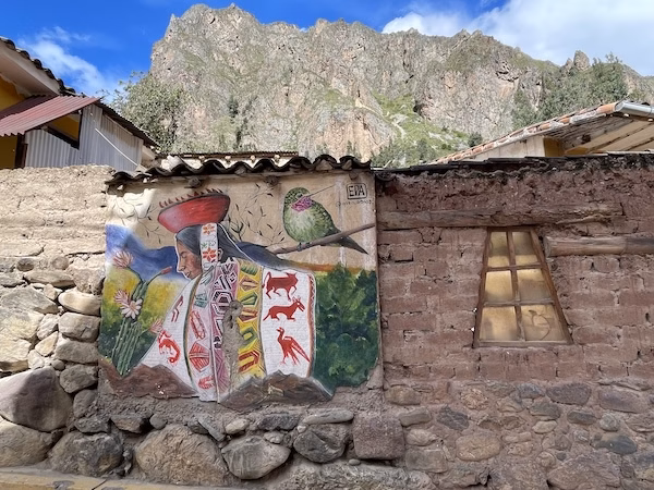 Colorful indigenous mural on a wall in Peru