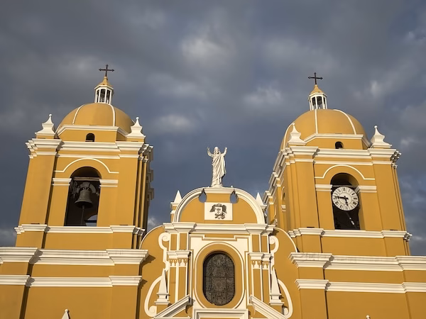 A yellow Spanish colonial style church in Trujillo, Peru