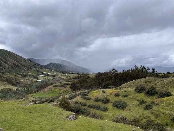 Clouds cover the mountains outside of Cusco, Peru