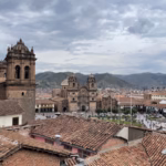 Tiled rooftops and main cathedral on the Plaza de Armas in Cusco, Peru