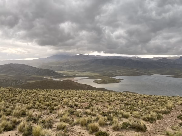 Clouds roll over the shores of Lake Titicaca