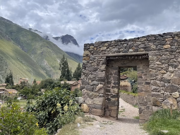An Incan stone gate leading to a trail in Ollantaytambo
