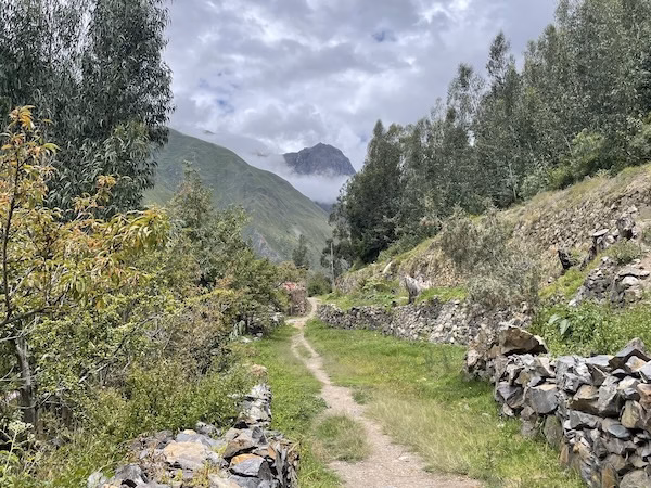 A trail winds through the mountains in the Peruvian Andes