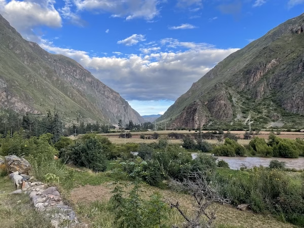 A view of the mountains and river in the Sacred Valley of Peru
