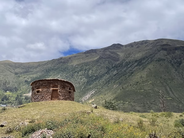 A small, round, stone hut built by the Inca in the Urco ruins near Calca in the Sacred Valley of Peru